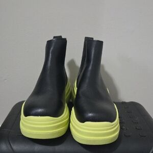 Chic Black Boots with Neon Yellow Soles
